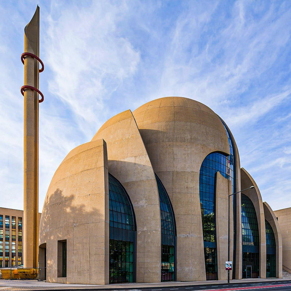 Cologne Central Mosque exterior with glass facade and minarets